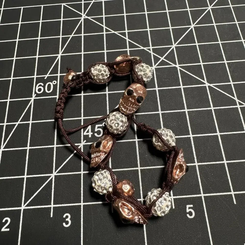 Rose Gold Tone Skull Bracelet with Crystal Rhinestone Beads and Adjustable Cord